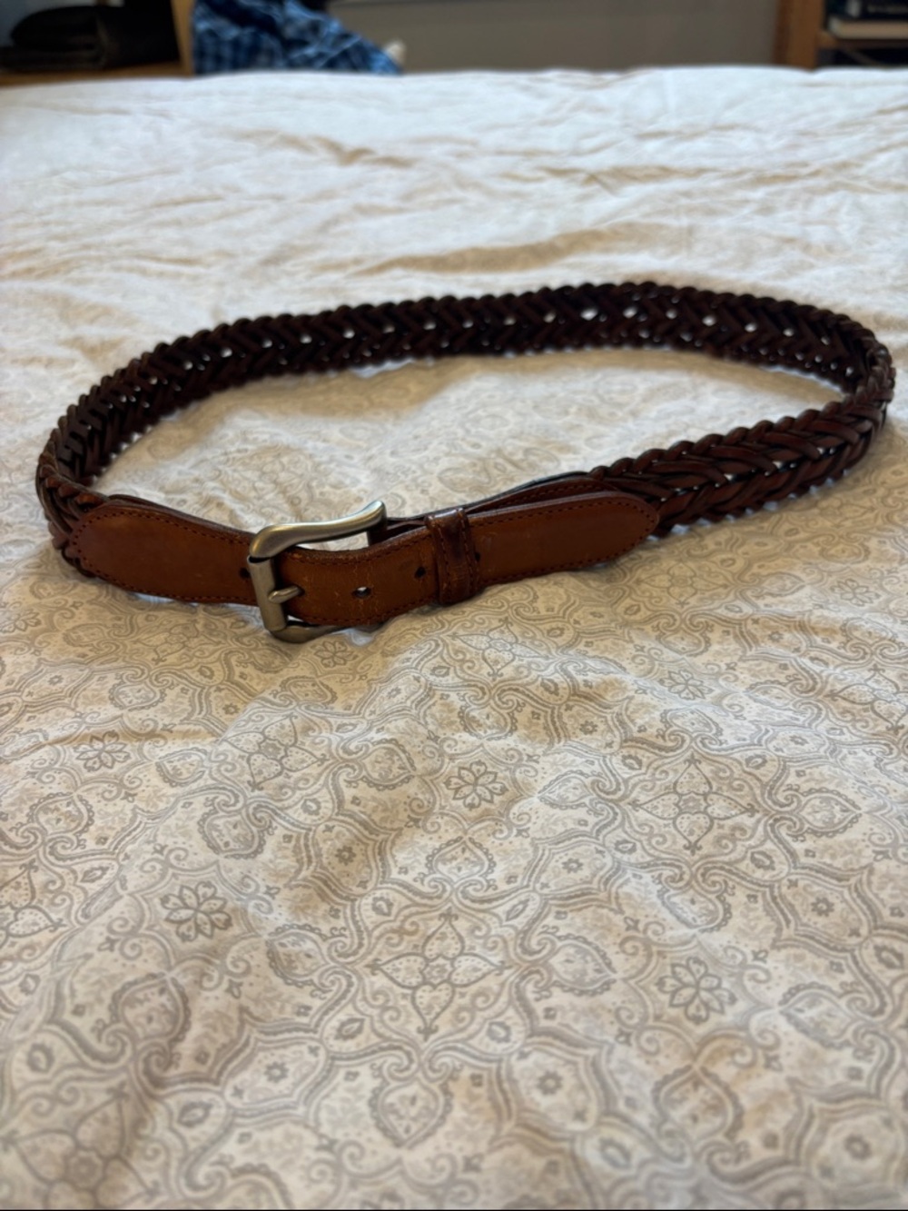 Women’s Coach braided belt 34” L 1.5” W British tan color